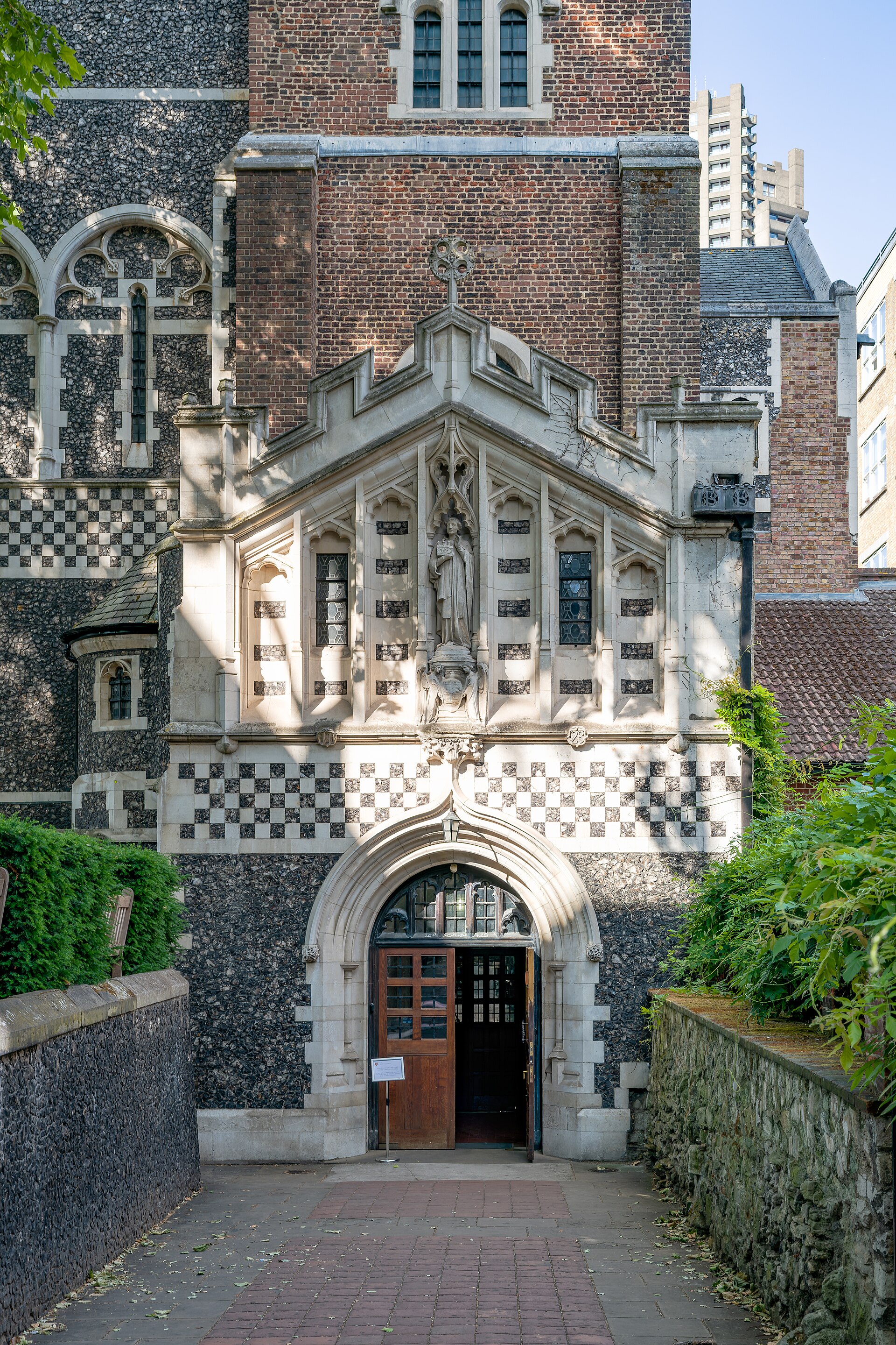 The half-timbered Tudor gatehouse and stone entrance to St Bartholomew the Great
